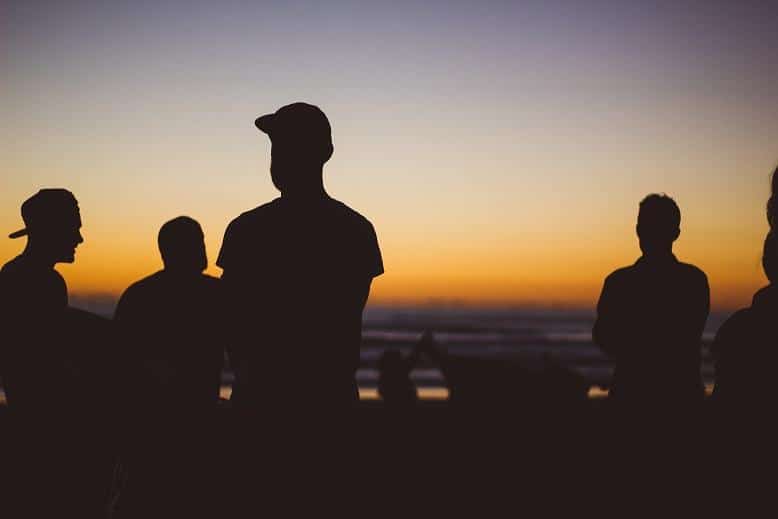 A group of shadowed people silhouettes